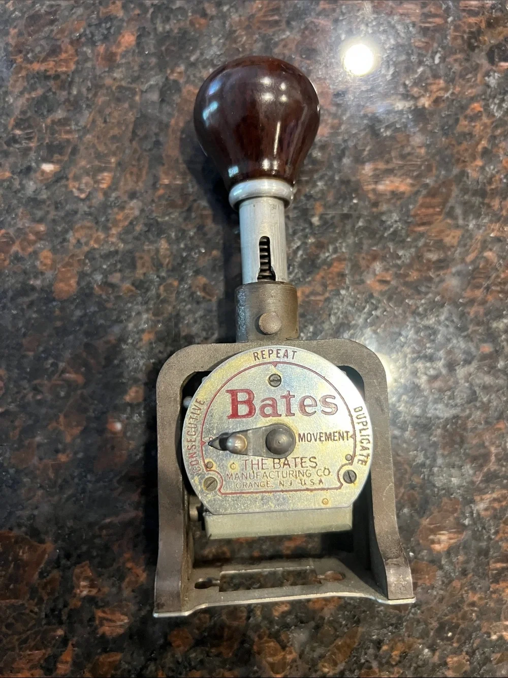 Bates Hand Numbering Machine in Brown and Brass Tones vintage.